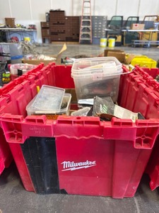 lot 276 image: Red Milwaukee Storage Bin with Assorted Anchors and Screws