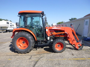 Kioti KL6010 Tractor with Box  Blade, Rotary Mower, Forks and Loader Bucket