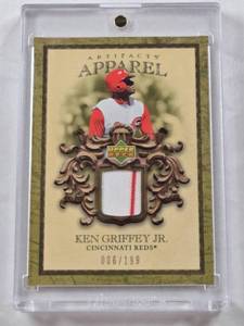 lot 7 image: Ken Griffey Jr. 2007 Upper Deck Artifacts Relic Numbered 006199 - Cincinnati Reds Baseball Card in Magnetic One Touch