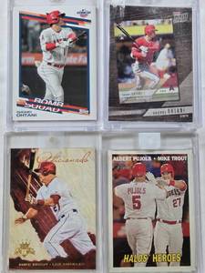 lot 37 image: Shohei Ohtani 2019 Topps Now, Albert Pujols and Mike Trout 2016 Topps Heritage Halos Heroes, Shohei Ohtani 2022 Topps Opening Day Bomb Squad, Mike Trout 2015 Panini Diamond Kings