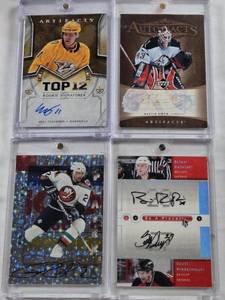 lot 129 image: Martin Biron 2005 Upper Deck Artifacts Auto, Brian Rafalski and Scott Niedermayer 2005 Be A Player Dual Auto, Eeli Tolvanen 2018-19 Upper Deck Artifacts Rookie Auto, Rich Pilon 1998 Pinnacle Auto