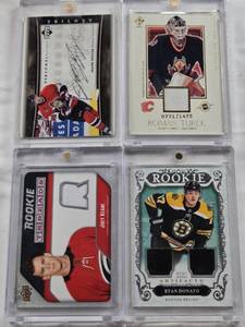 lot 134 image: Roman Turek 2003 Pacific Patch 7711475, Ryan Donato 2018-19 Upper Deck Artifacts Rookie Patch 210499, Jason Spezza 2005-06 Upper Deck Trilogy Auto, Joey Keane 2021-22 Upper Deck Rookie Patch