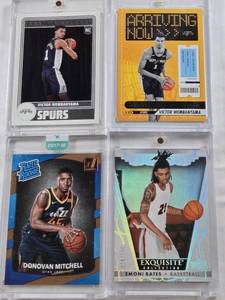 lot 139 image: Victor Wembanyama 2023-24 Panini Arriving Now Rookie, Emoni Bates 2023 Upper Deck Exquisite Collection 26149 Rookie, Victor Wembanyama 2023-24 NBA Hoops Rookie, Donovan Mitchell 2017-18 Donruss Rated Rookie