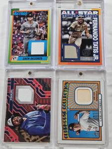 lot 170 image: Fernando Tatis Jr. 2025 Topps 1990 Baseball All-Stars Patch, Carlos Correa 2021 Topps Heritage Clubhouse Collection Relic, Zach Dezenzo 2025 Topps 1990 Baseball Patch, Reynaldo Lopez 2025 Topps City Connect Patch 1950