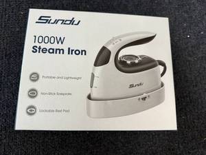 lot 57 image: Sundu 1000W Steam Iron