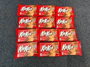 lot 214 image: 12 Kit Kat Bars - Chocolate Donut Flavor