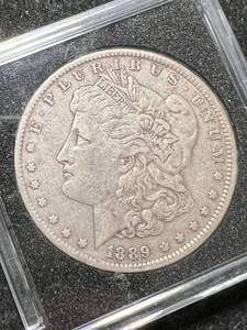lot 06 image: 1889 US MORGAN SILVER DOLLAR