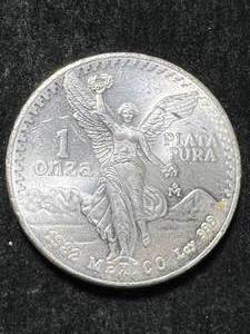 lot 53 image: 1982 MEXICAN LIBERTAD 1 TROY OZ .999 FINE SILVER