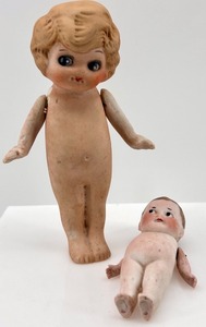 lot 17 image: Pair of Antique Bisque Jointed Dolls including Kewpie