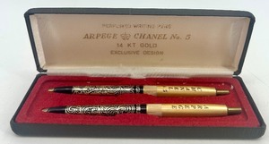 lot 52 image: ARPEGE Chanel No. 5 14KT Gold Exclusive Pen and Pencil Set in Case