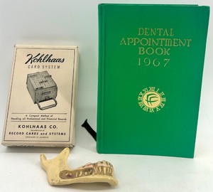 lot 59 image: Vintage Dental Office Collection with Kohlhaas Card System, 1967 Appointment Book, and Jaw Model