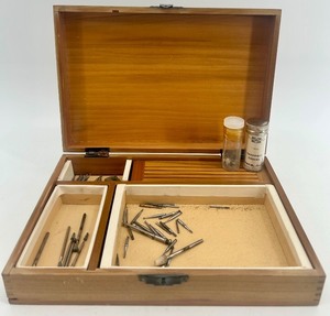 lot 61 image: Wooden Case with Assorted Small Metal Tool Bits and Vials