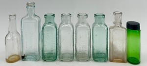 lot 113 image: Collection of 8 Vintage Glass Bottles and Jars Mixed Shapes and Colors