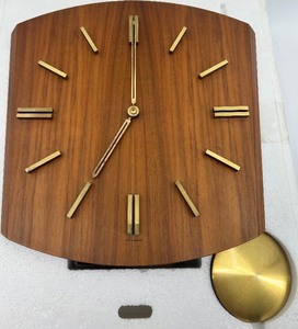 lot 176 image: Junghans Mid-Century Modern Wall Clock with Pendulum and Chains