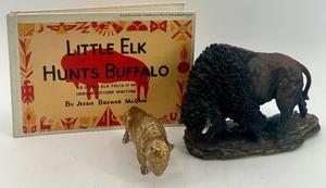 lot 314 image: Little Elk Hunts Buffalo Book with 2 Buffalo Figurines