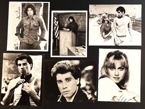 lot 203 image: John Travolta and Olivia Newton-John Set of 6 Vintage Black and White Movie Stills 