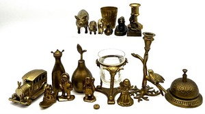 lot 325 image: Vintage Brass Decor Collection with Figures, Car, Candle Holders, and More