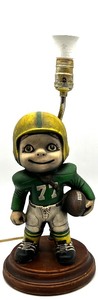 lot 332 image: Green Bay Packers Vintage Football Player Figurine Table Lamp with Wooden Base