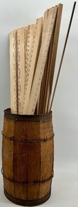 lot 389 image: Vintage Wooden Barrel with Collection of Yardsticks and Rulers