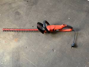 lot 22 image: Black & Decker Hedge Hog-Cutter on Both Sides