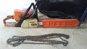 lot 513 image: Stihl Chain Saw, 20 in. Bar, with Extra Chains (4).