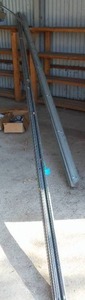 lot 617 image: Garage Rails 18 x 10 ft., Spring, Pulleys and Misc. Parts.
