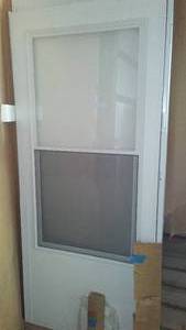 lot 407 image: Larson Exterior Storm Door, Pre-hung, 36 x 80-81 in.