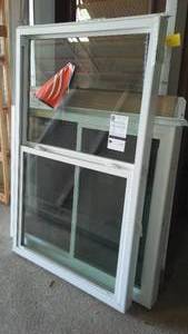 lot 524 image: Thermo Tech Vinyl Single Hung Window.