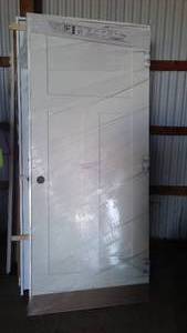lot 447 image: Bayer  Primed 3  panel  Pre-hung  Interior Door, 34 in. LH.