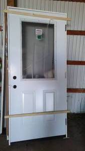 lot 448 image: Manions Exterior36 in.  Pre-hung Door with Lite Panel.
