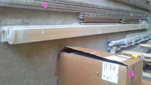 lot 834 image: White Primed 5 in. Moulding. (Q10),