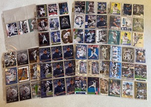 lot 163 image: Derek Jeter Large Baseball Card Collection in Binder Sheets