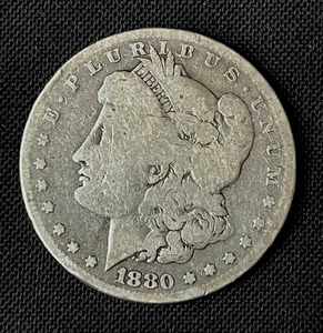 lot 23 image: 1880-O Morgan Silver Dollar
