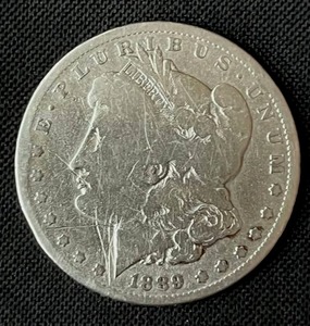 lot 25 image: 1889-O Morgan Silver Dollar