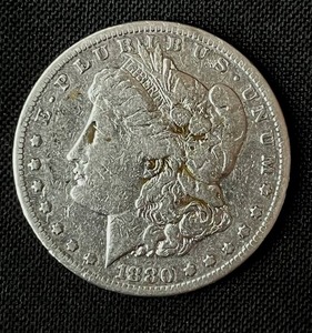 lot 29 image: 1880-S Morgan Silver Dollar