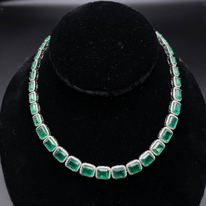 lot 1012 image: Statement 67.59 Carat Natural Emerald & Natural Diamond Halo Necklace in Platinum w Report