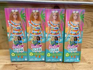 lot 230 image: Barbie Loves the Ocean Doll with Blonde Hair Wearing Floral Sundress & Accessories, Fashion Doll & Clothes Made from Recycled Plastics