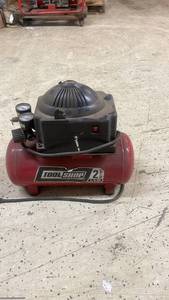 lot 5 image: Tool Shop 2 Gallon Portable Air Compressor