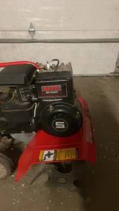 lot 168 image: Yard Machines 21A-24MB729 Gas-Powered Garden Tiller
