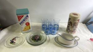 lot 189 image: Kitchenware Collection with Blue Glasses, Flower Plates, Vintage Tins, and Gravy Boat