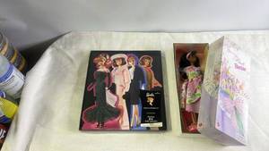 lot 203 image: Barbie Collectible Set with Spring Petals Barbie and Collector Series Card Collection