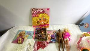 lot 215 image: Barbie Doll Lot with Sticker Album, Books, Accessories, and Ken Doll