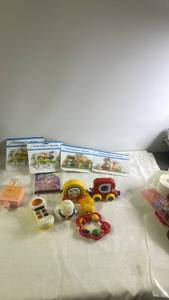 lot 229 image: Lot of Assorted Baby Toys with Wall Hooks and Childrens Music CD