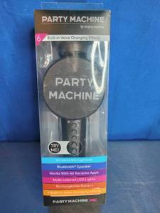 lot 35 image: Party Machine microphone by Singing Machine.