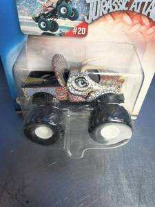 lot 46 image: Hot Wheels Monster Jam Jurassic Attack die-cast truck.