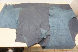 lot 24 image: Blue Leather