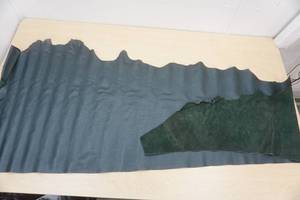lot 47 image: Green Leather