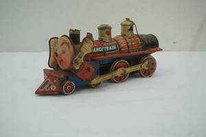lot 115 image: Vintage Lithographed Battery-Operated Toy Train Fancy Train