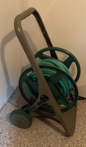 lot 199R image: G - Portable Hose Reel Cart with Garden Hose