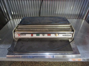 lot 48 image: Wrapping Machine 18x23x5